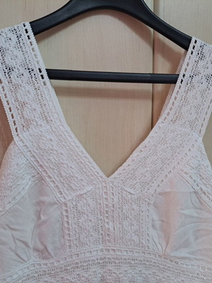 Women's long white dress with lace straps and lining