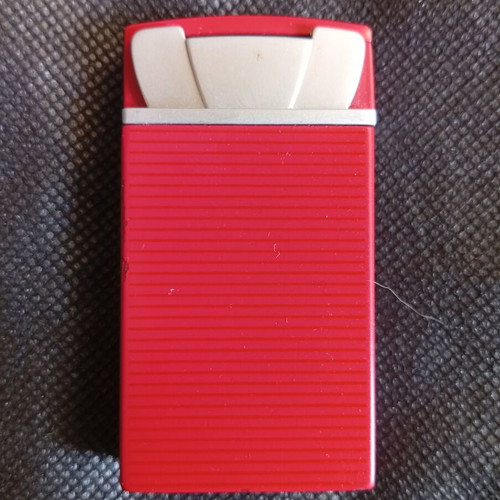 Prince lighter red metal promotional like new