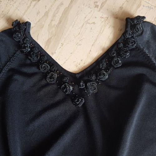 Black blouse new with decorative organza roses neckline, size M