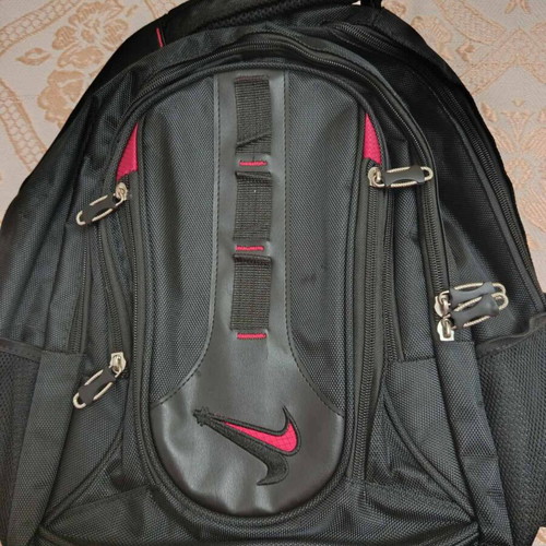 Nike travel backpack with 8 compartments