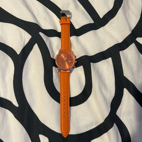 Unisex wristwatch new with orange synthetic leather strap