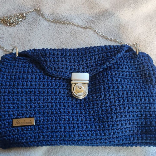 Knitted shoulder bag new blue with silver details