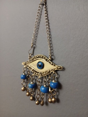 Vintage metal evil eye decoration used, silver with blue beads