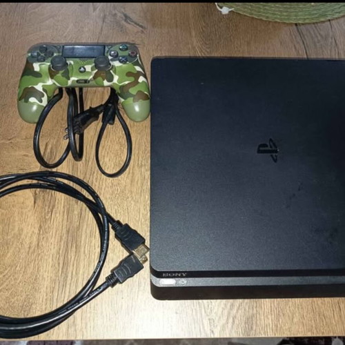 PS4 Slim 1TB console with original controller and cables