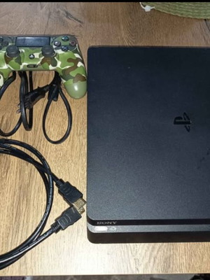 PS4 Slim 1TB console with original controller and cables