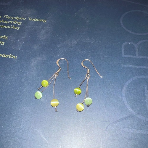 Silver earrings with green stones used, excellent condition