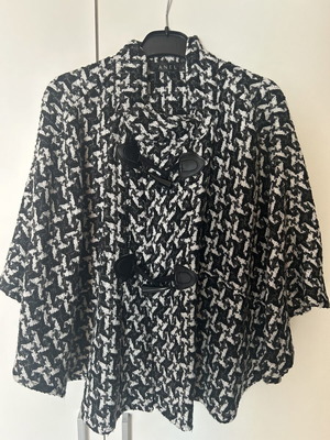 Anel short jacket-cape in black and white pattern