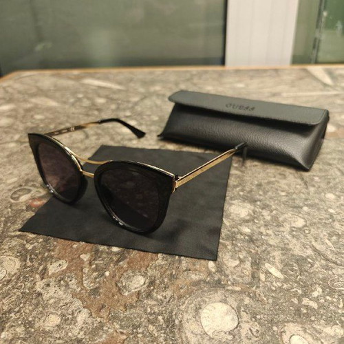 Guess women's sunglasses with black protective case and cloth