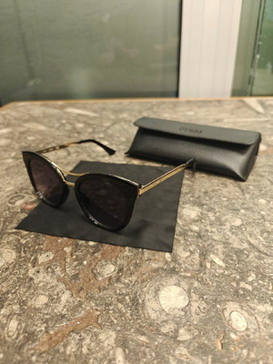 Guess women's sunglasses with black protective case and cloth