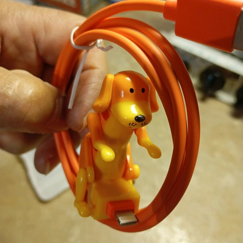 iPhone charger new with moving dog figure