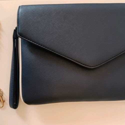 Clutcher bag Carpisa like new, blue with white piping