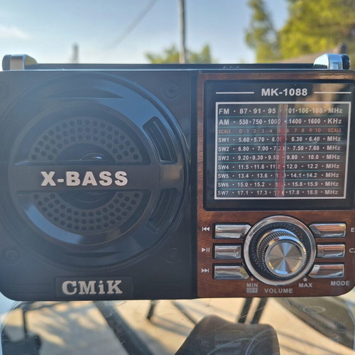 CMiK portable radio with flashlight and AUX cable