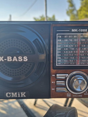 CMiK portable radio with flashlight and AUX cable