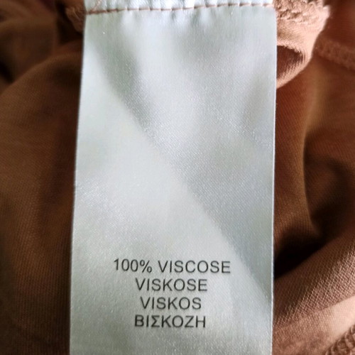 Beige salmon short-sleeve blouse Medium with an opening at the back
