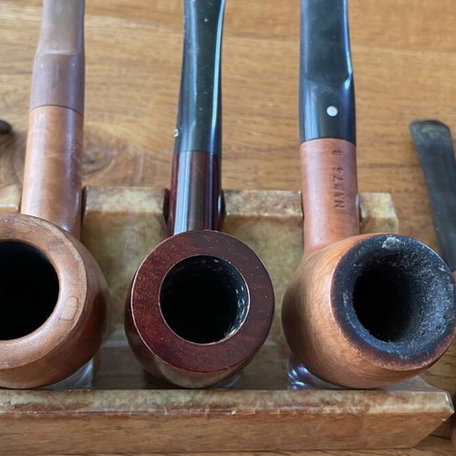 Smoking accessories like new, pipes, stands, pouches and cleaning tools