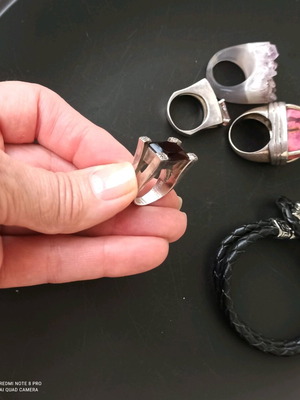 Silver ring with dark brown stone used