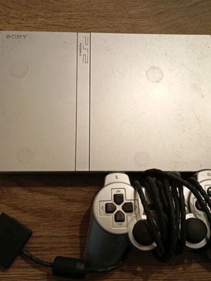 PlayStation 2 used with 5 games and memory card
