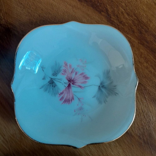 Porcelain plates and miniature bowls, old unused