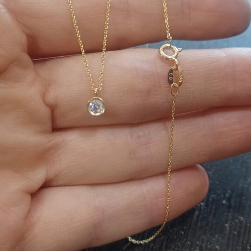 K14 gold pendant like new with zircon stone
