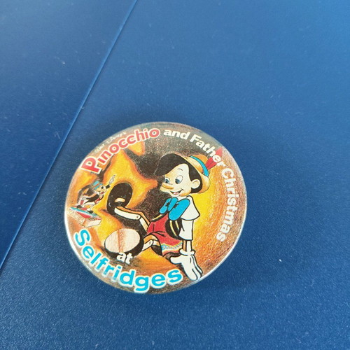 Pinocchio pin used, multicolored Selfridges