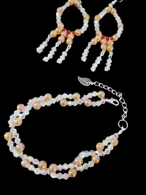 Bracelet set with dangling earrings new, with pearls and crystals