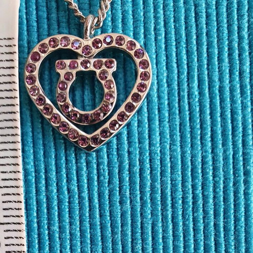 Salvatore Ferragamo authentic necklace like new with purple and silver crystals