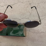 Children's sunglasses used, silver color