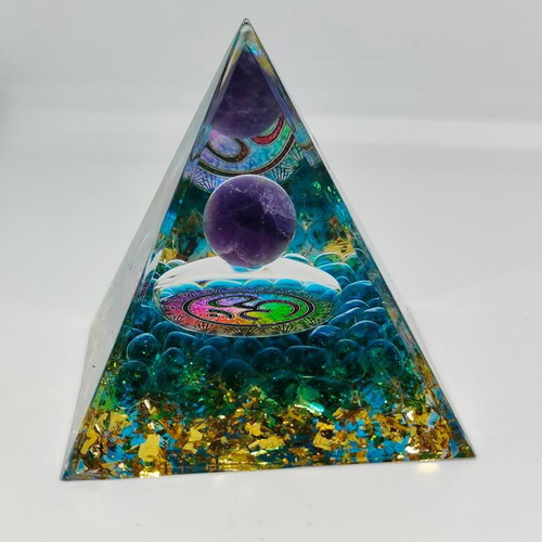 Orgonite pyramid with amethyst and Om symbol like new