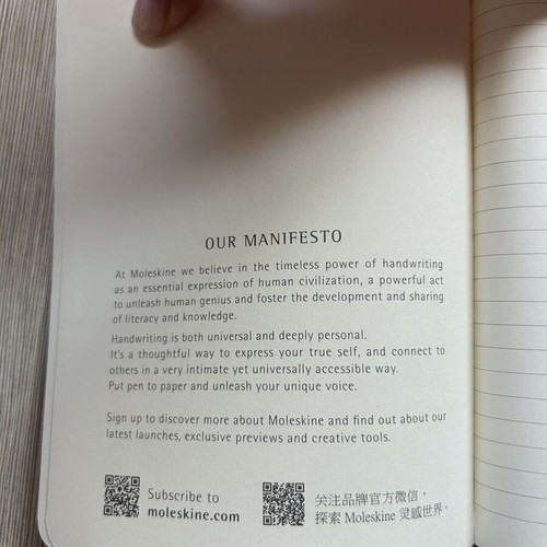 Moleskine black notebook with embossed cover