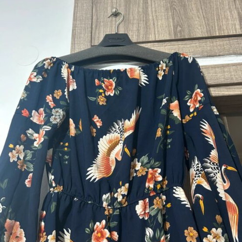 Women's blouse with off-shoulder design like new, blue floral
