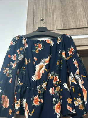 Women's blouse with off-shoulder design like new, blue floral