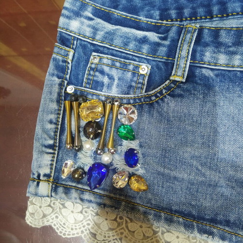 Jeans shorts decorated with beads, size S