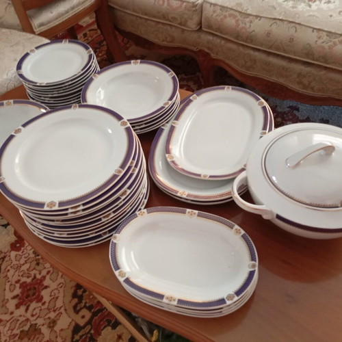 Dinnerware set like new with soup tureen, salad bowls, and plates