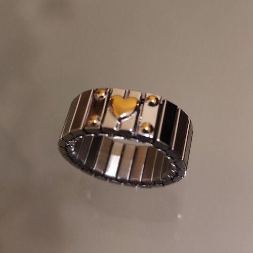 Silver ring with gold heart stainless steel new, size 8