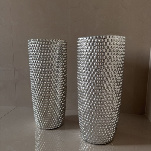 Set of two modern silver embossed vases like new