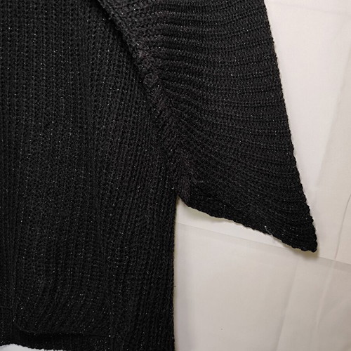 Black knitted sweater used with shiny detail and asymmetric sleeves size XL