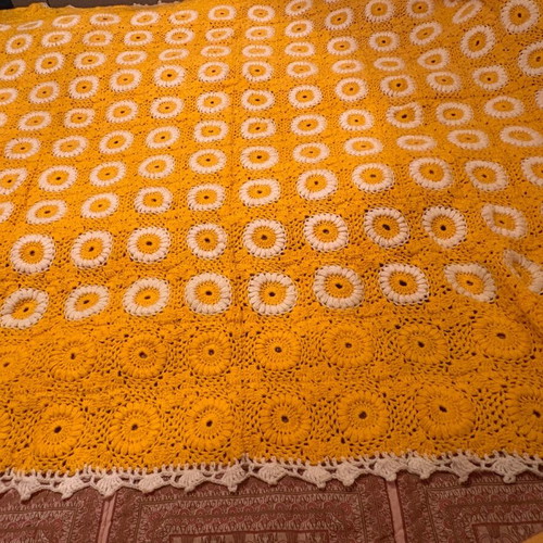 Handmade crochet blanket like new, yellow with flowers