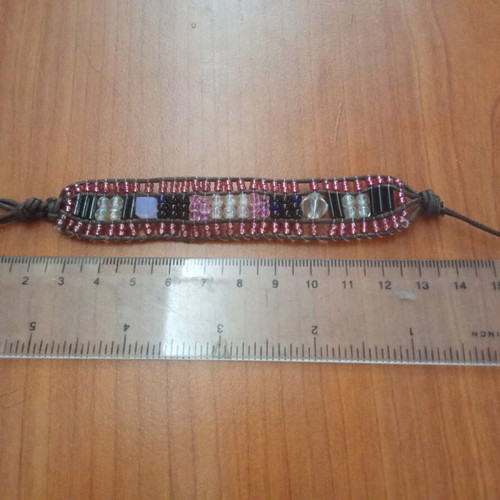 Handmade bracelet with purple and pink beads like new