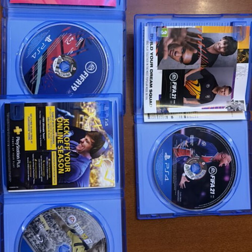 PlayStation 4 Fat 500GB bundle with FIFA games and 2 controllers like new