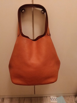 Large leather bag like new, burnt orange color