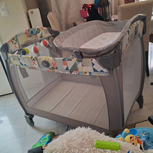 Grey playpen with changing table used