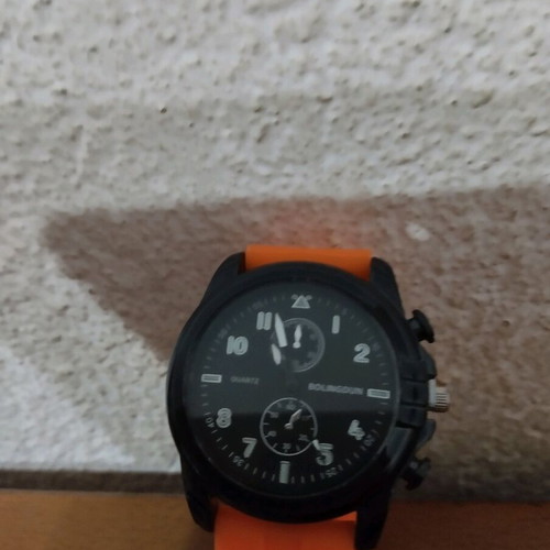 Watch orange with plastic strap like new