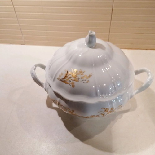 Porcelain soup tureen used with gold floral details