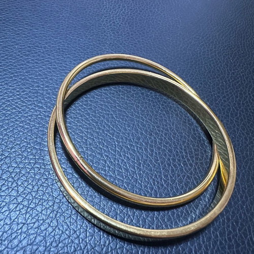 Steel double rod bracelet gold used