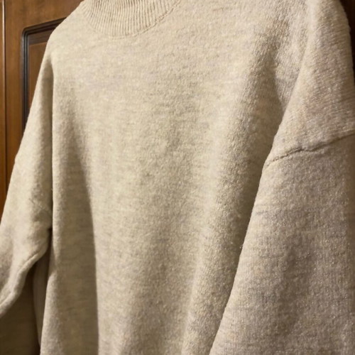 Beige pullover like new, large fits small and medium