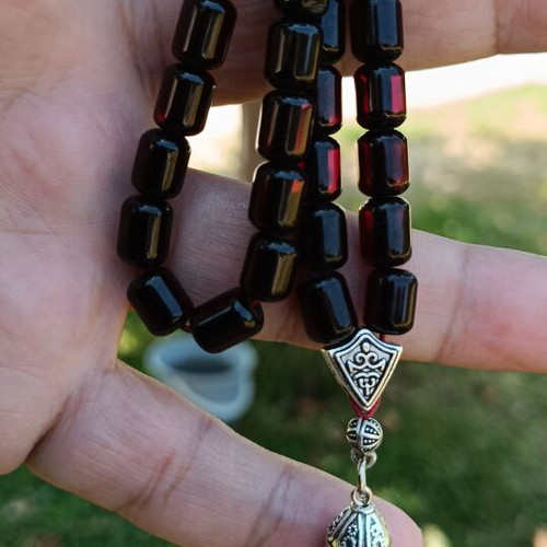 Komboloi worry beads, 33 black cherry mastic beads