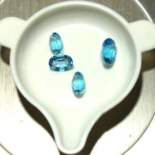 Blue Topaz minerals 4.50 ct. new, set of 4 pieces