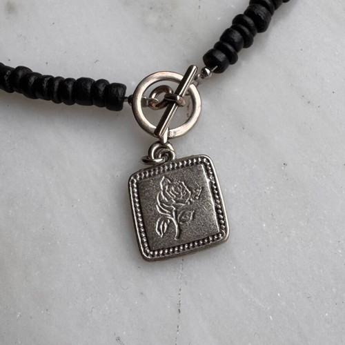 Ethnasia necklace used with black beads and rose charm