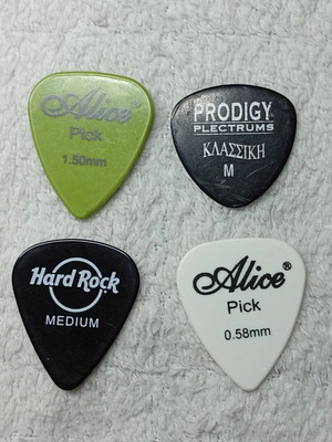 Plectrums for String Instruments used, variety of shapes and thicknesses