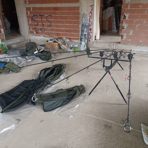 Carp fishing rods like new with full equipment and 4-person boat